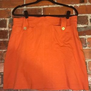 Super cute orange H&M miniskirt with gold buttons
